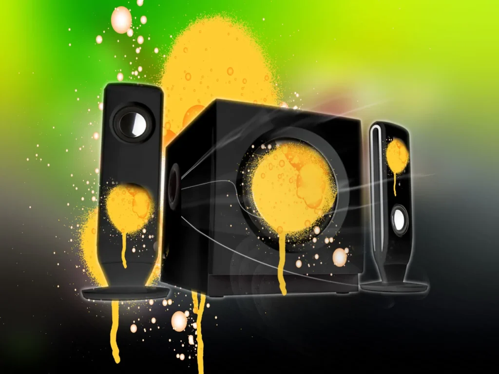 Grafik mit Lautsprechern und einer Musiknote